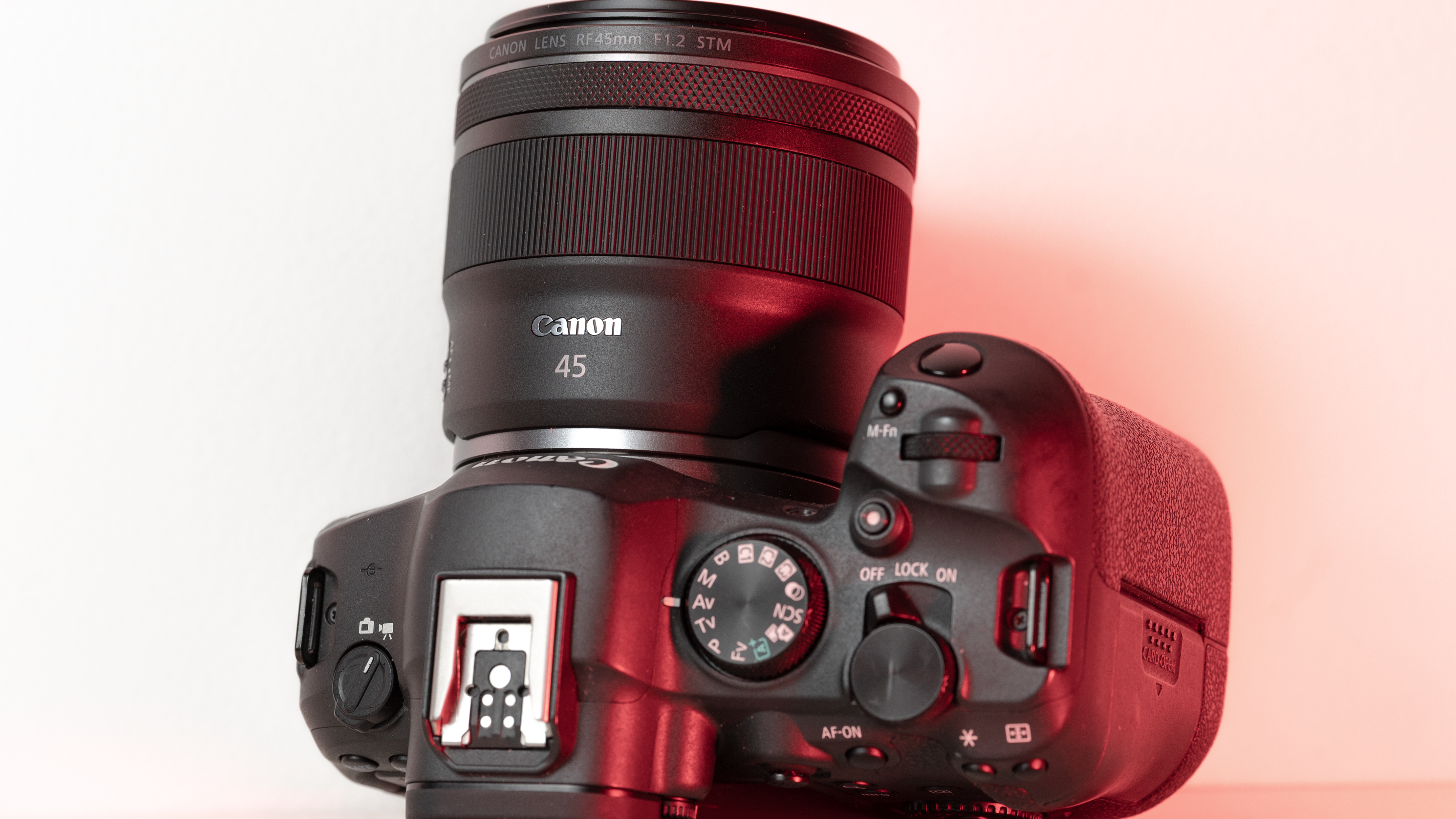 A picture of the Canon RF 45mm f/1.2 lens mounted on the Canon EOS R6 Mark II from the top.