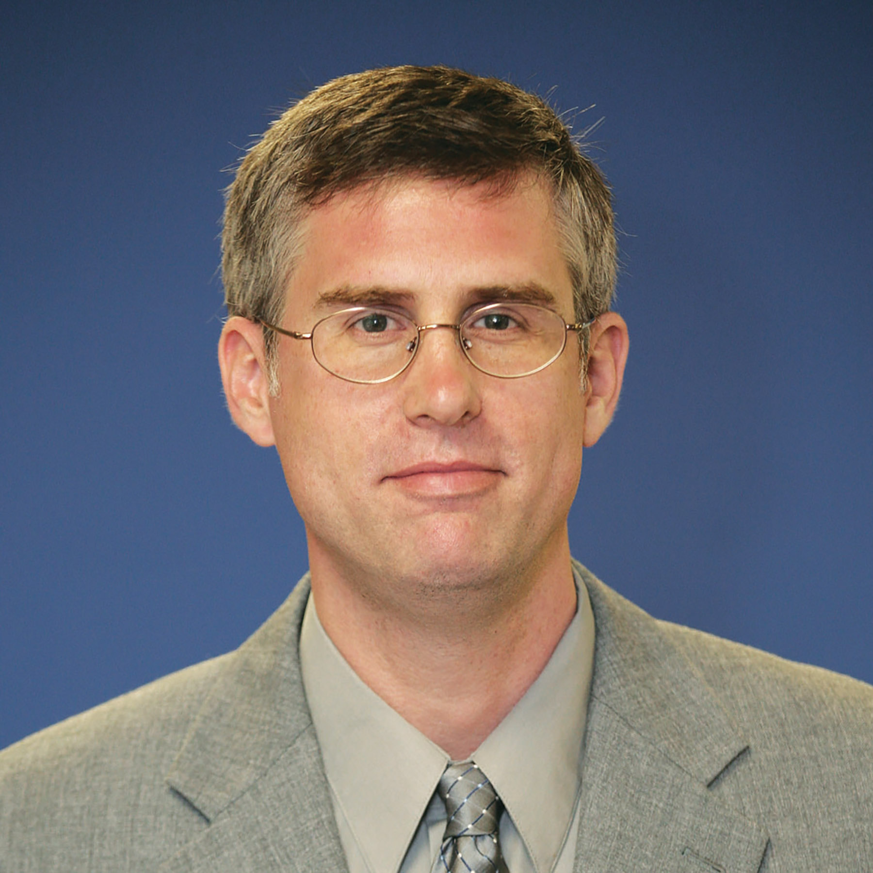 The Audio-Technica InfoComm Impulse logo and headshot of Mark Donovan.