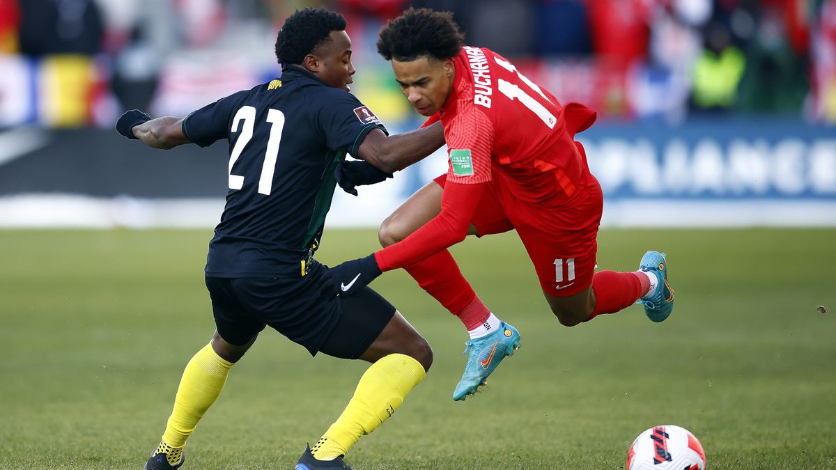 Tajon Buchanan (R) is fouled by Javain Brown (L) ahead of the Jamaica vs Canada live stream