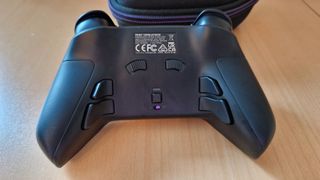 Victrix Pro BFG review image showing the back of the controller with the four extra buttons, trigger stop switches, and profile button