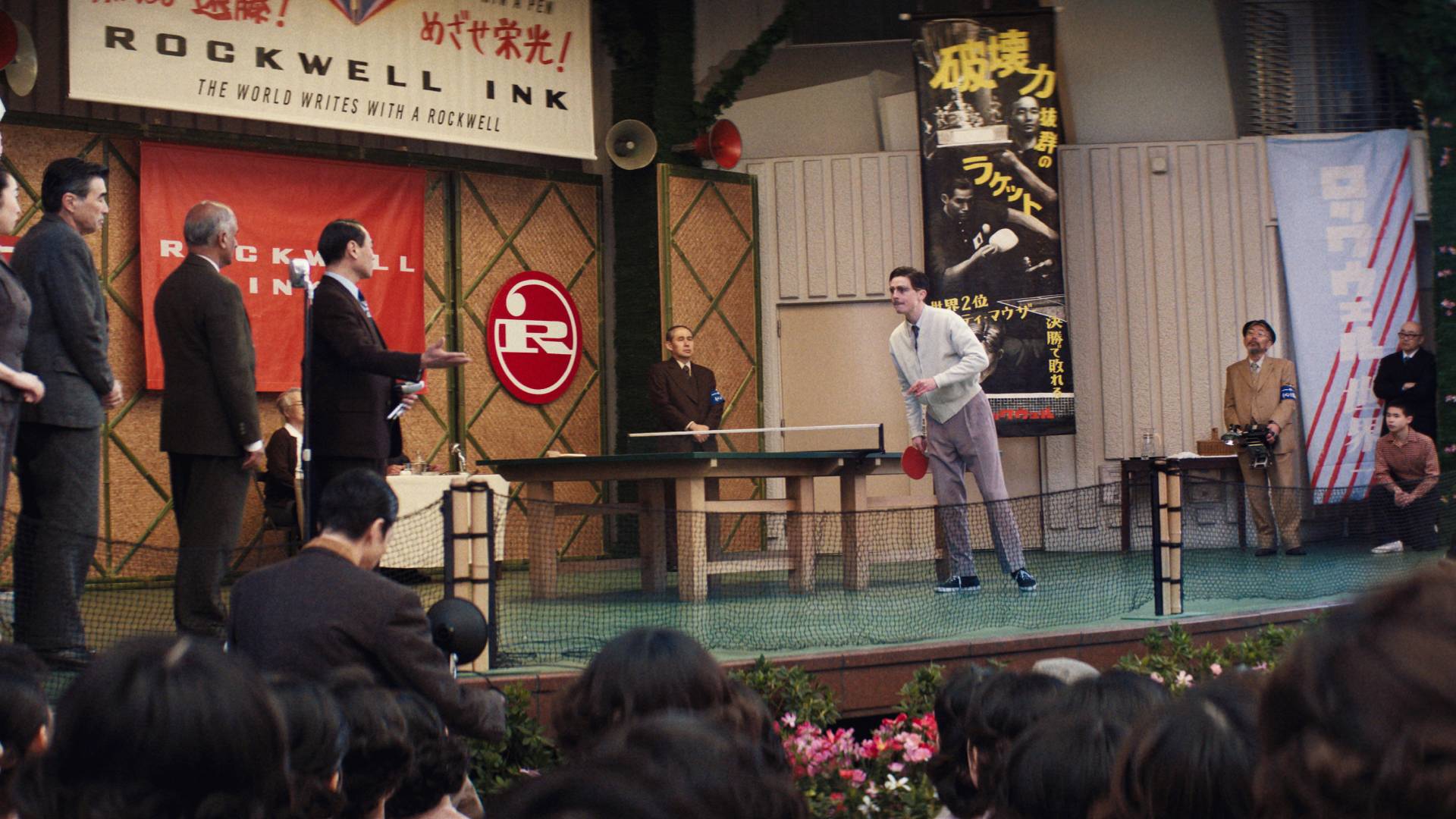 Timoth&amp;eacute;e Chalamet as Marty Supreme playing ping pong in Japan