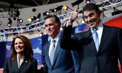 Frontrunners Gov. Rick Perry and Mitt Romney will take to the debate stage Monday in the first Tea Party hosted event and fight it out for key primary states.