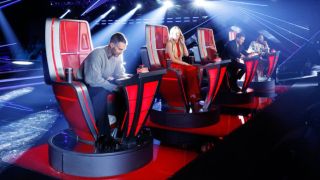 Adam Levine (left) and the other Season 27 coaches of The Voice listen to a Blind Audition.