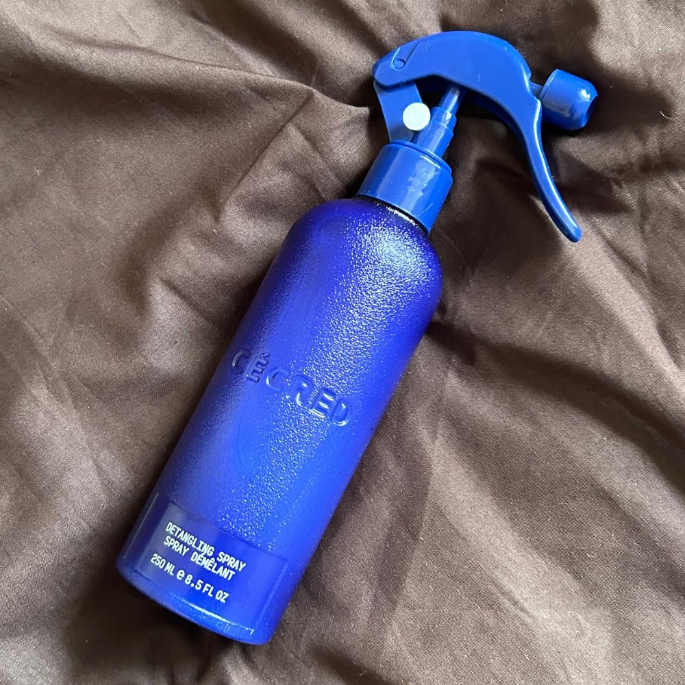 A close-up shot of Cécred's Detangling Spray