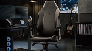 Image of the Secretlab Titan EVO NanoGen Edition in black, setup in a darkened office.