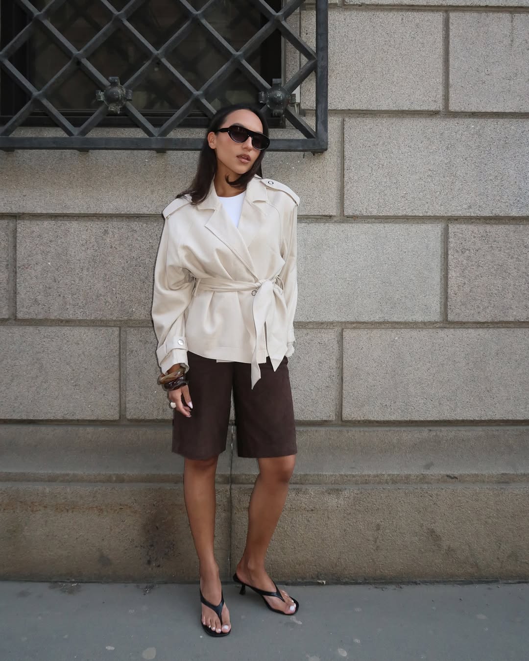 Ingrid in cropped trench and Bermuda shorts