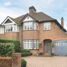  A three-bedroom 1930s semi near Watford in Hertfordshire, home of Charlie and Paul Galsworthy and their children, exterior view.