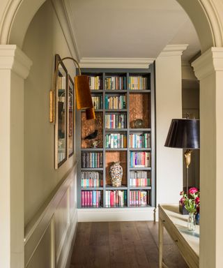 Hallway with bookcase and console table