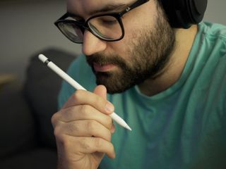 Man holding Apple Pencil