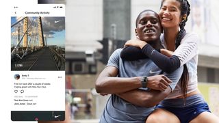 Nike Run Club app on smartphone and two runners hugging