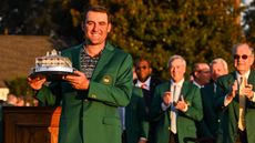 Scottie Scheffler poses with the trophy after winning the 2022 Masters