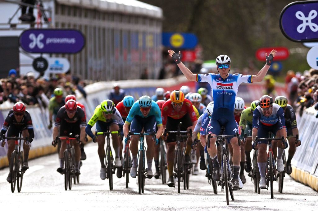 SCHOTEN BELGIUM APRIL 03 Tim Merlier of Belgium and Team Soudal QuickStep celebrates at finish line as race winner during the 112th Scheldeprijs 2024 Mens Elite a 2053km one day race from Terneuzen to Schoten on April 03 2024 in Schoten Belgium Photo by Luc ClaessenGetty Images