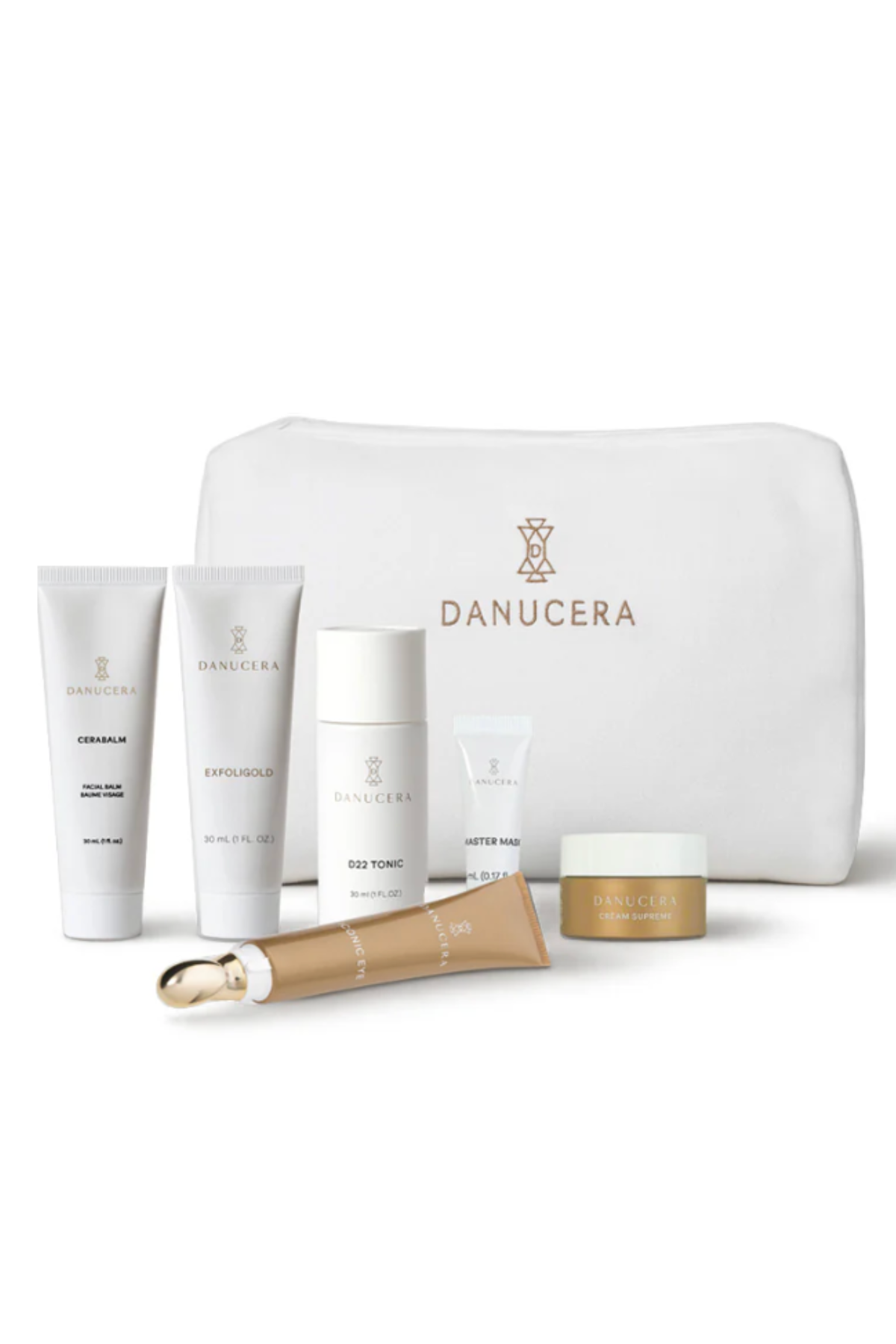 a white bag with gold writing and 4 white bottles and 2 gold bottles