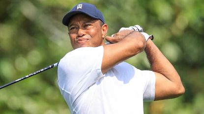 Tiger Woods takes a tee shot during the 2023 Masters