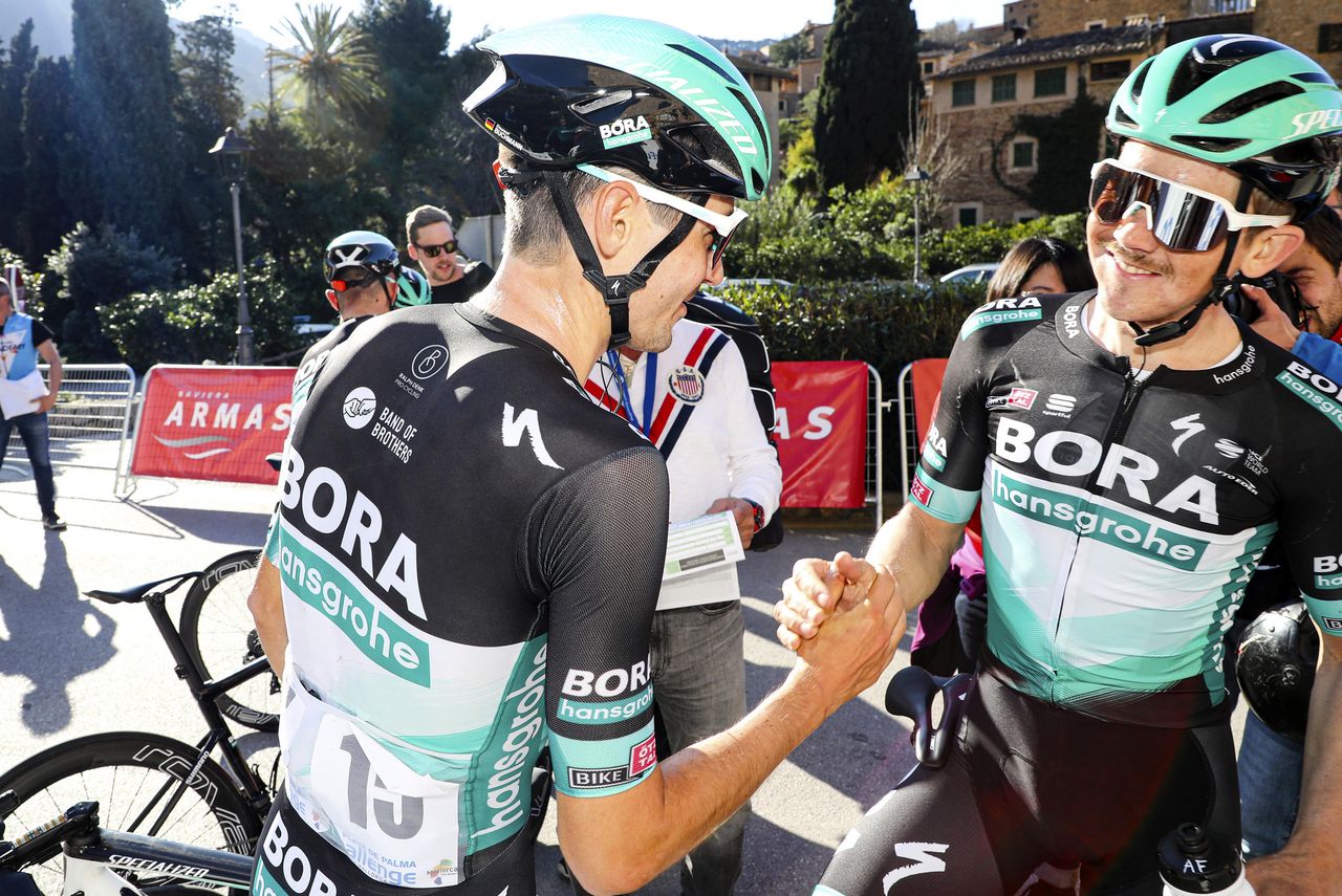 Emanuel Buchmann celebrates with his Bora-Hansgrohe team