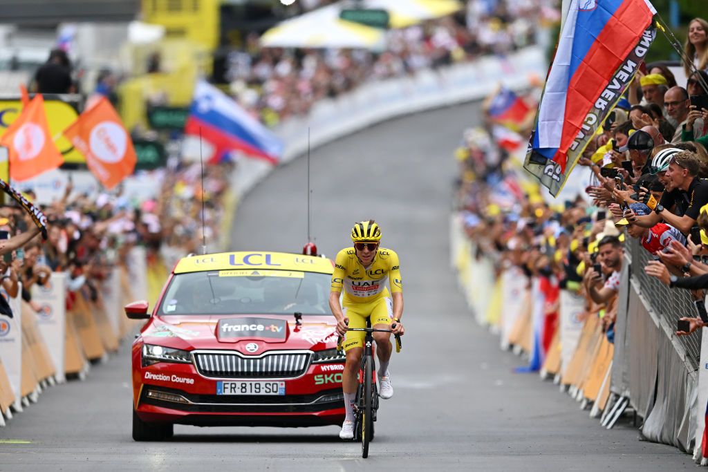 ISOLA 2000 FRANCE JULY 19 Stage winner Tadej Pogacar of Slovenia and UAE Team Emirates Yellow Leader Jersey sprints at finish line during the 111th Tour de France 2024 Stage 19 a 1446km stage from Embrun to Isola 2000 2022m UCIWT on July 19 2024 in Isola 2000 France Photo by Dario BelingheriGetty Images