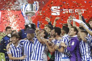 Real Sociedad lift the trophy