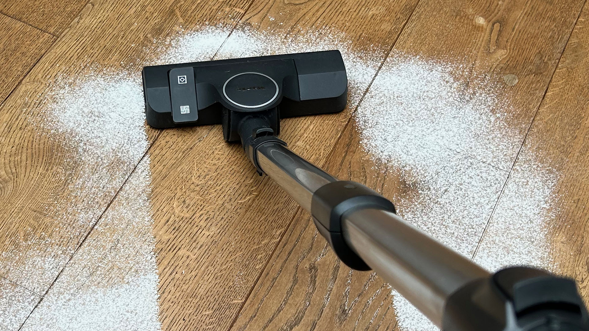 Miele Boost CX1 vacuum cleaning flour from hard floor