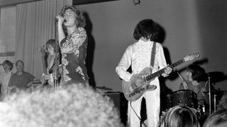 Jimmy Page performs with Led Zeppelin in the band's early days