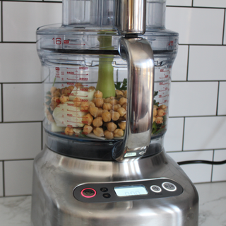 Breville Paradice 16 cup food processor mixing chickpeas and tahini to make hummus