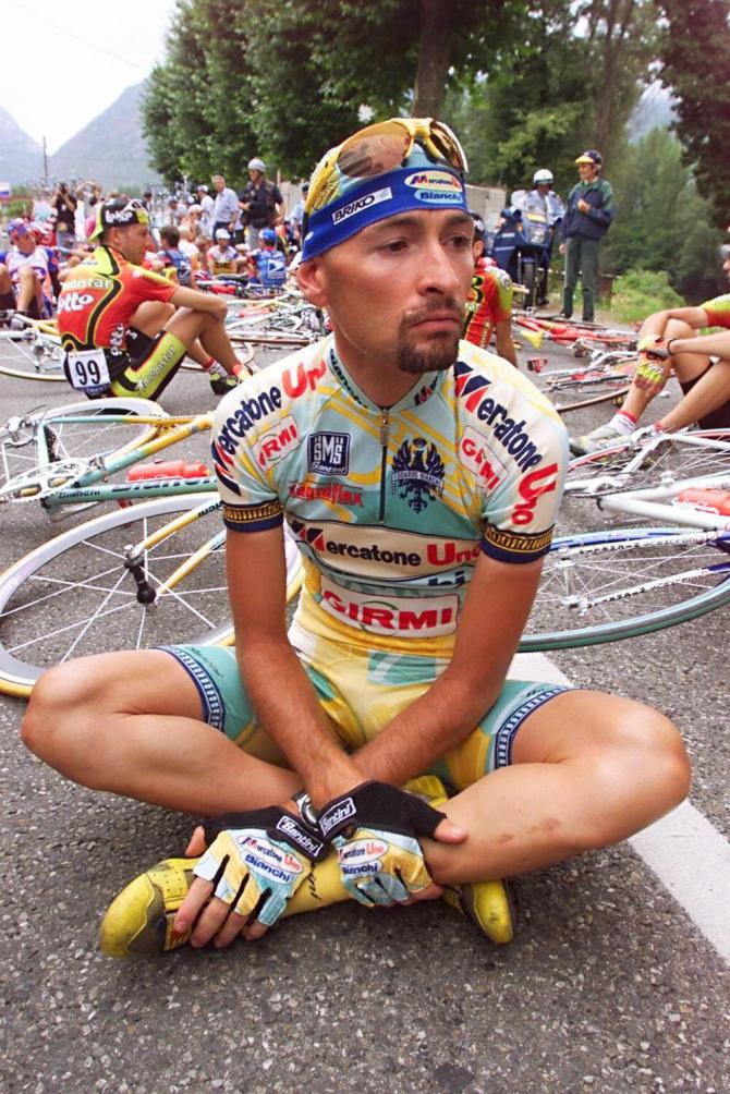 Marco Pantani sits down as riders protest at the 1998 Tour de France