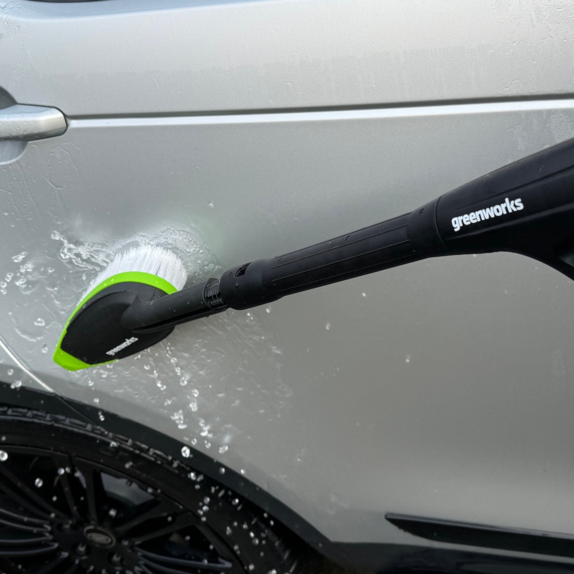 using the greenworks g40 pressure washer brush on a white car