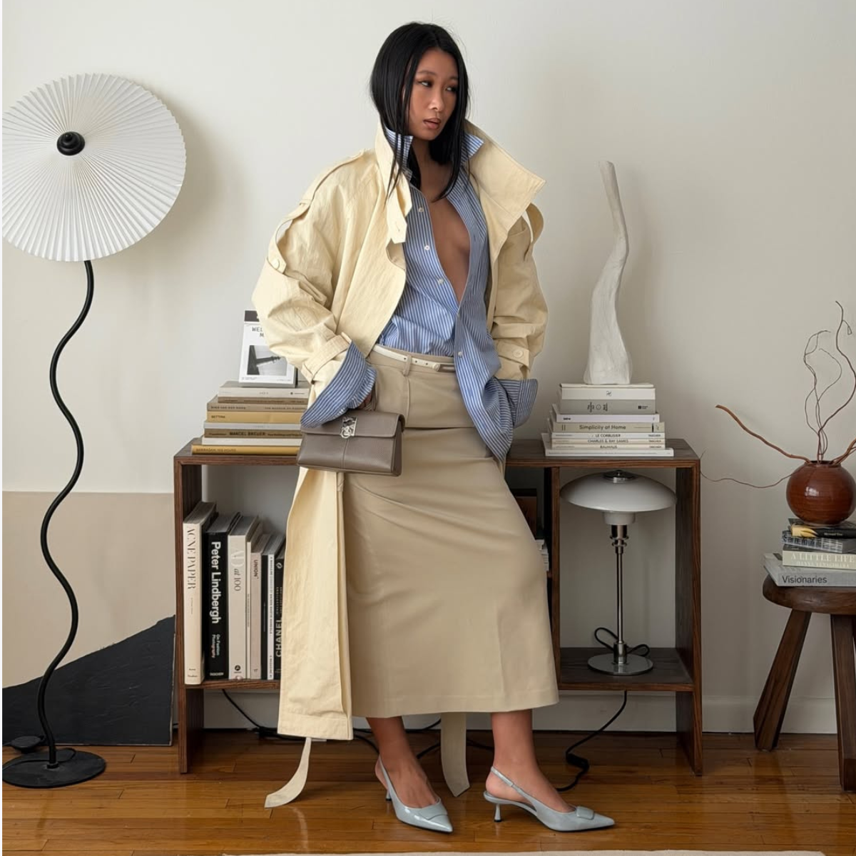 @thecarolinelin wears skirt, shirt and heels