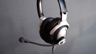 The AceZone A-Spire gaming headset on a grey background.