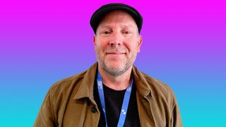 Chad Nelson OpenAI interview; a man in a hat and brown shirt