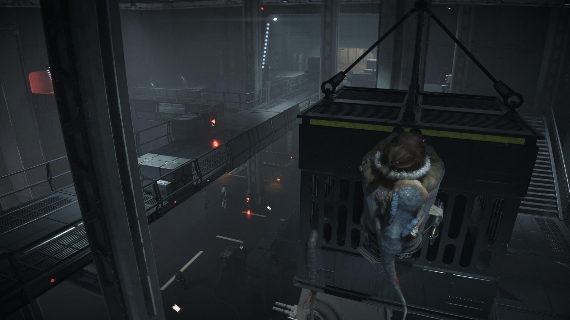 Kay hangs on a crate in Star Wars Outlaws