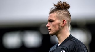 Harvey Elliott of Fulham warms up during the Premier League match between Fulham and Everton at Craven Cottage on April 13, 2019 in London, United Kingdom.