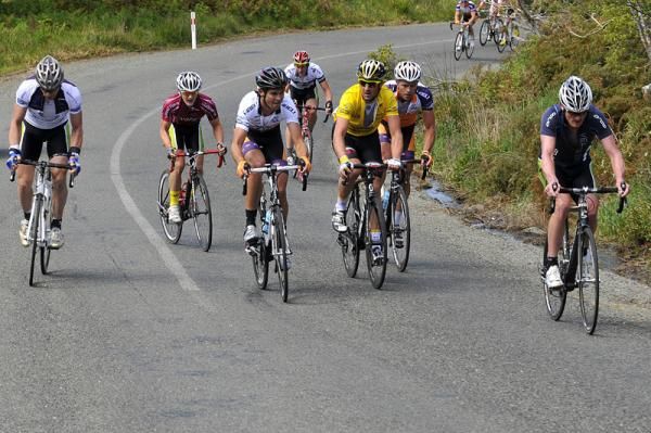 A select group of riders lead on the ascent up Bluff Hill.