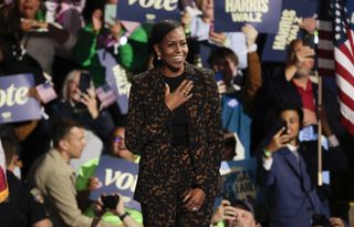 Michelle Obama wears a tortoiseshell suit by Theory while campaigning in Michigan