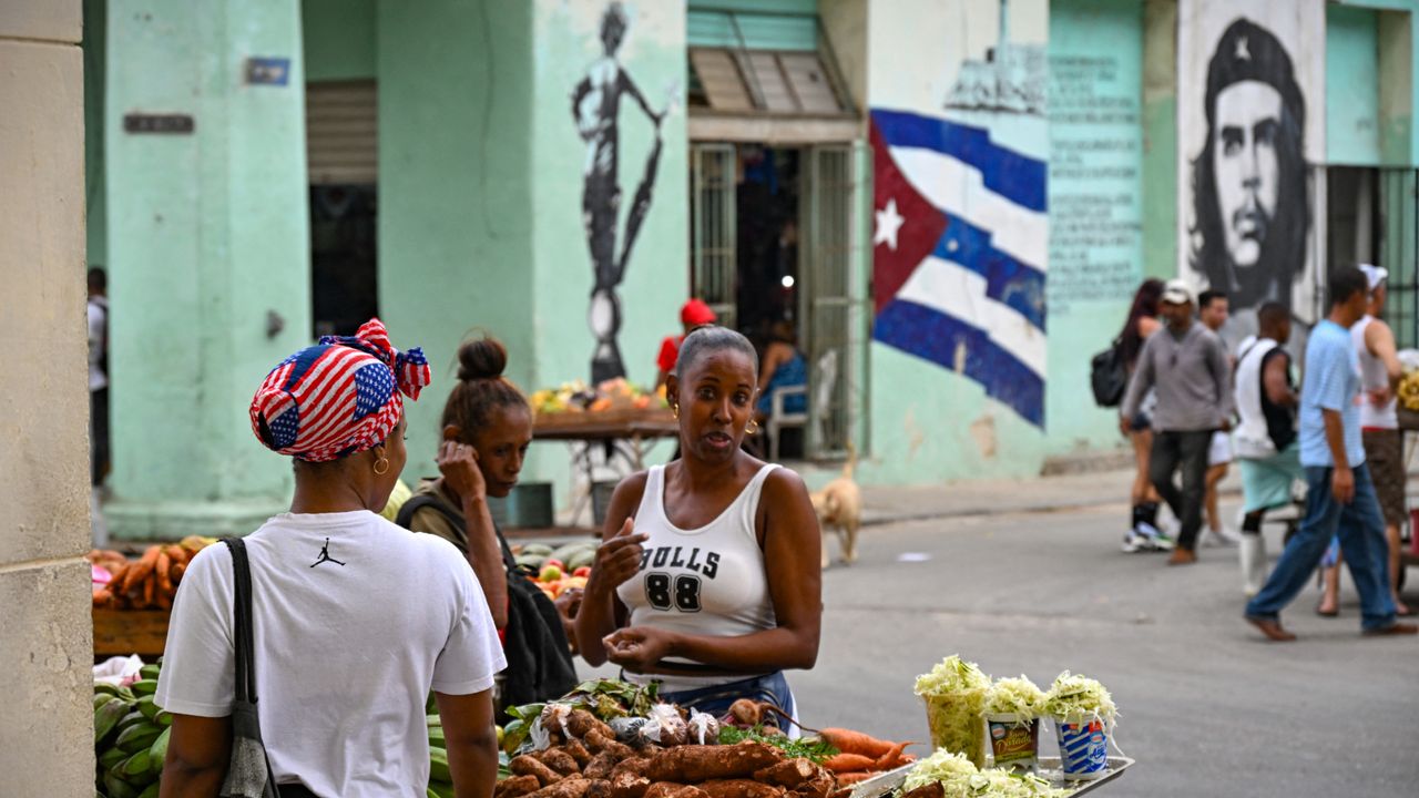 Cubans wearing American-themed apparel