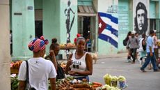 Cubans wearing American-themed apparel