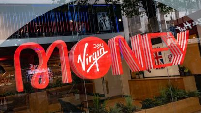 Virgin Money sign in window of high street branch