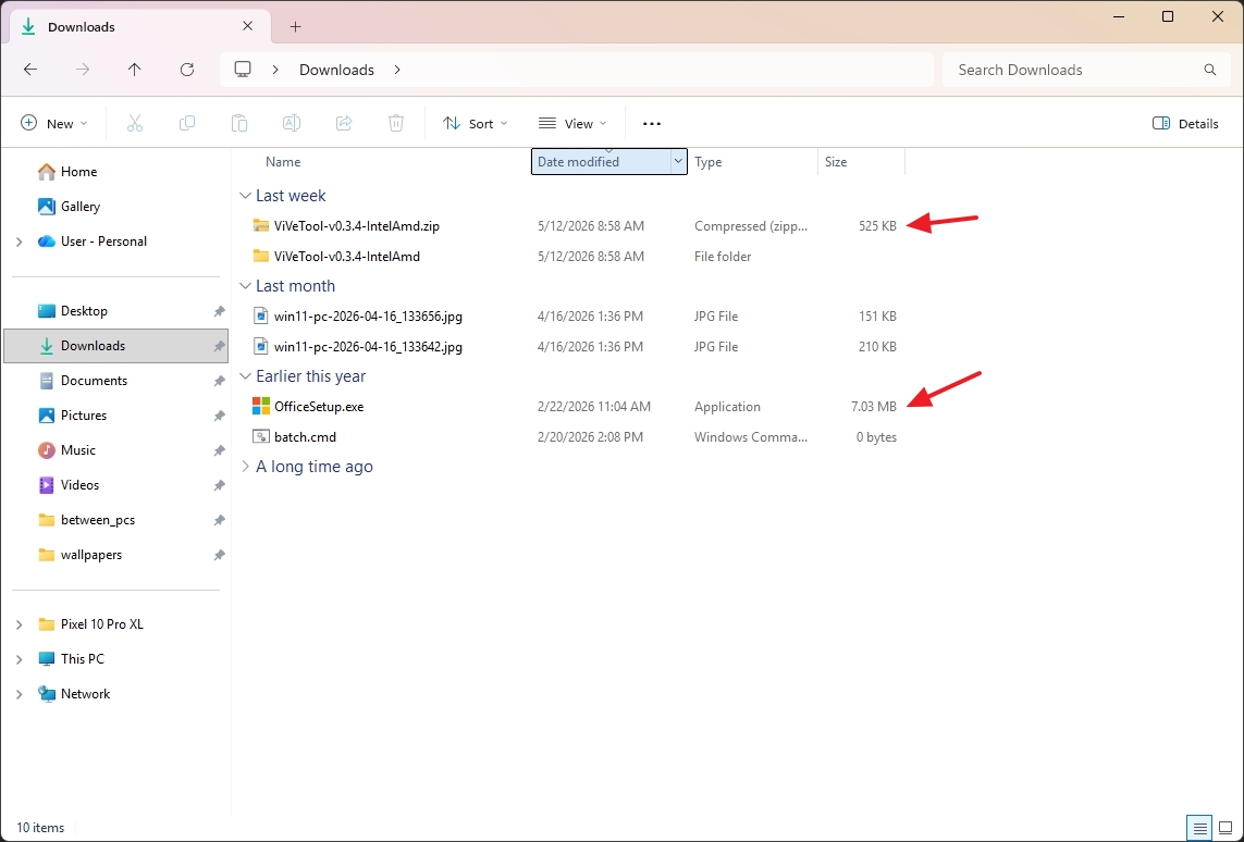 File Explorer window showing a Downloads folder with items sorted by date. Two files are highlighted with red arrows, showing size details.