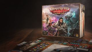 The box of the Divinity: Original Sin board game on a table.