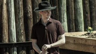 Chandler Riggs as a Hilltop farmer in The Walking Dead season 11