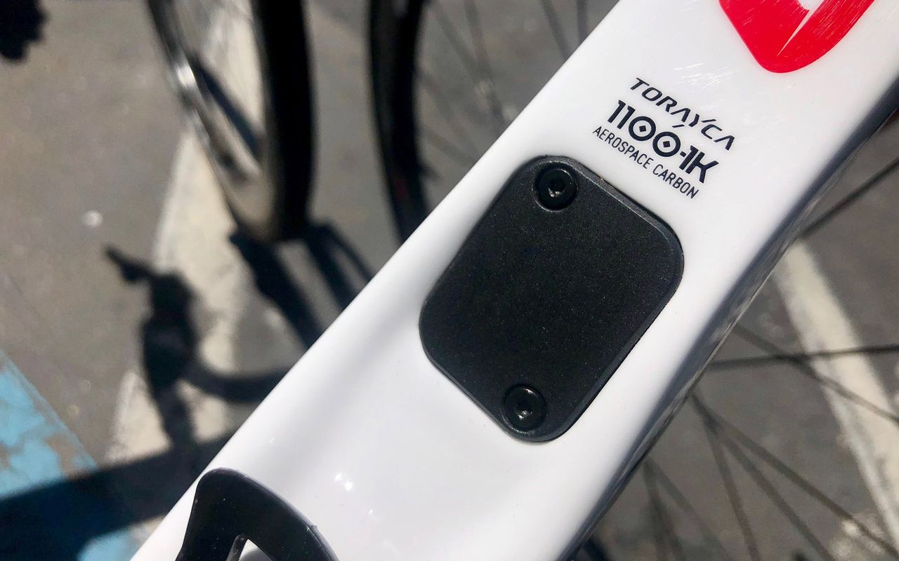 Hagens Berman Axeon race with SRAM eTAP groupsets and so the interface port has a blanking plate in place
