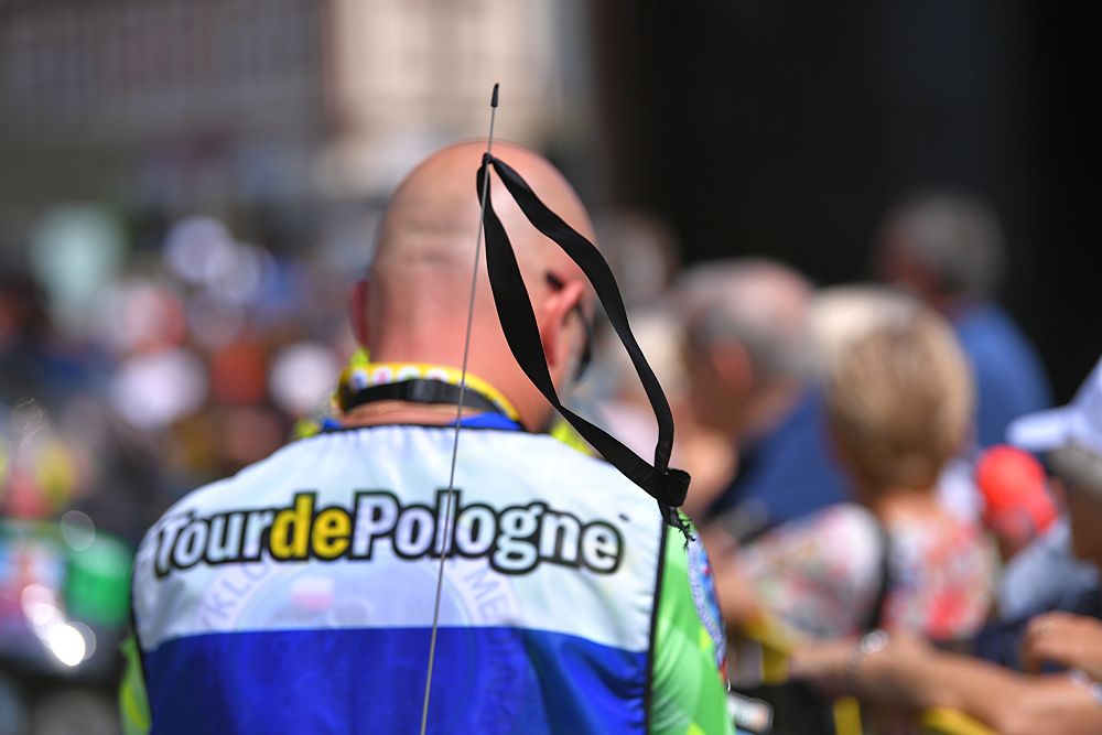 Riders, staff and event organisers at the Tour de Pologne wear black ribbons out of respect for Bjorg Lambrecht who died in an accident during stage 3