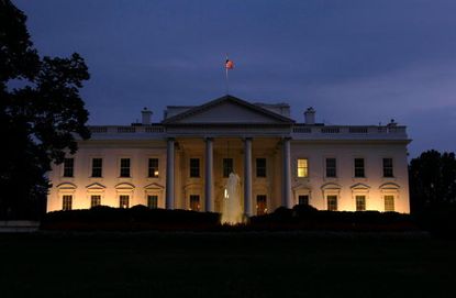 The White House at night.