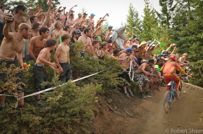 Fans cheer on a rider at the Enduro World Series in France