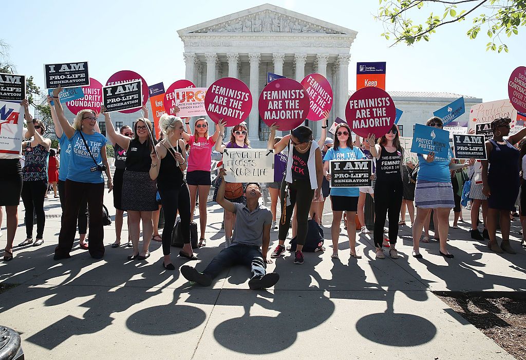 Anti- and pro-abortion rights protesters.