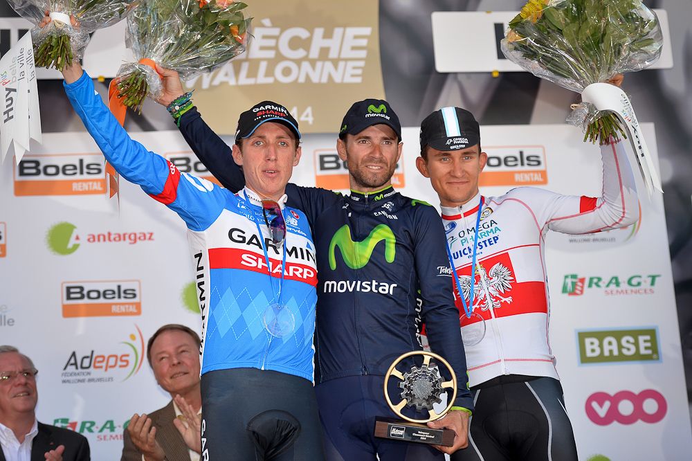 Daniel Martin of Team Garmin-Sharp, Alejandro Valverde of Movistar Team and Michal Kwiatkowski of team Omega Pharma - Quick Step celebrate on the podium after the 78th 'La Fleche Wallonne' in 2014.