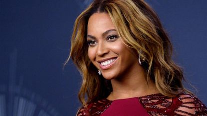 Beyonce poses backstage at the 2014 MTV Video Music Awards at the Forum in Inglewood, California on August 24, 2014