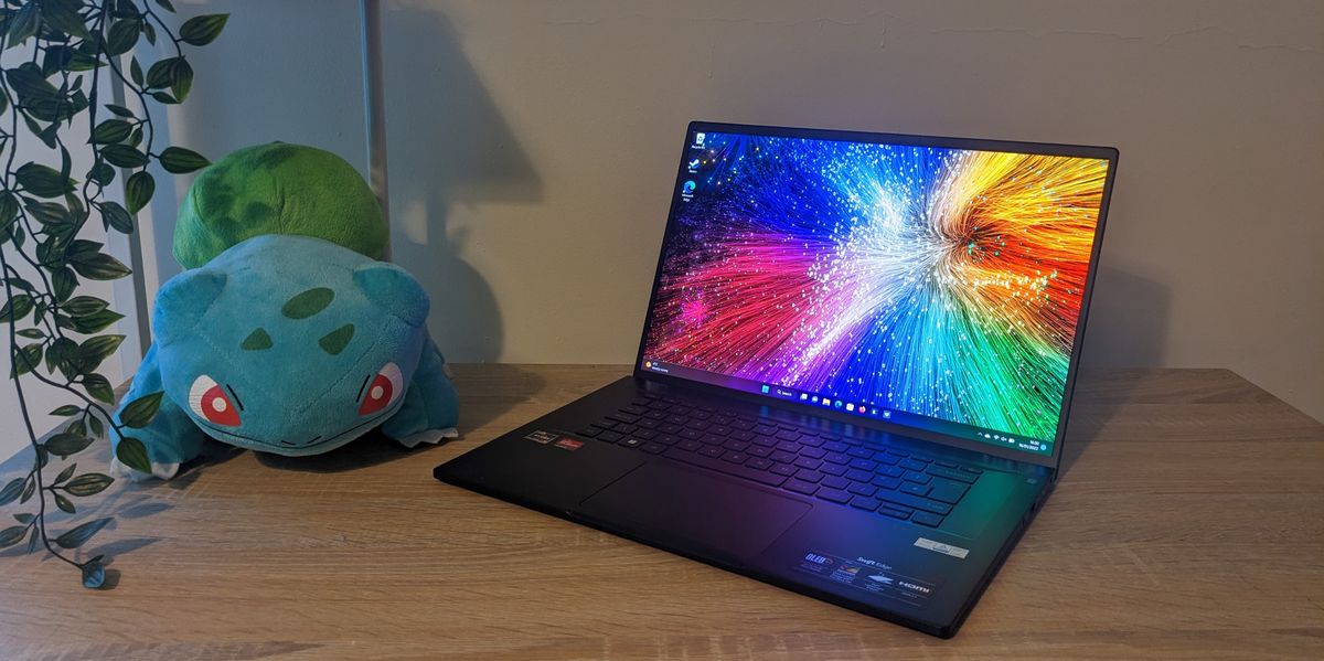 Acer Swift Edge photographed on a wooden desk.