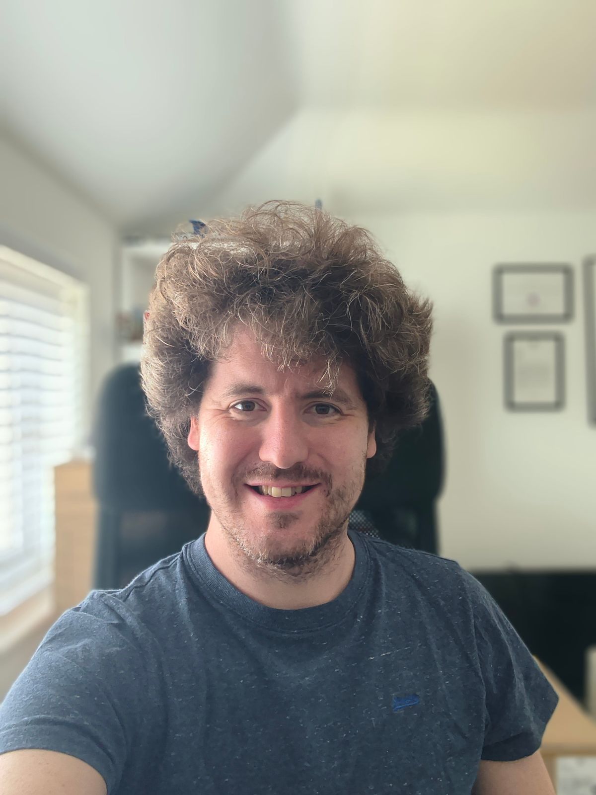 Selfies of a man taken with the Motorola Razr 2026