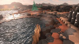 A sunset over a landscape made up of hexagon tiles
