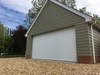 This insulated aluminium RD77 Double Superior Garage Door